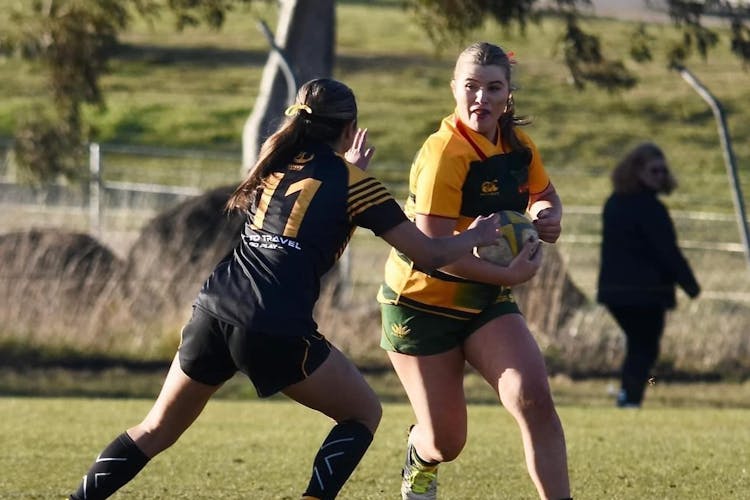 Tasmanian youth rugby leader Anna Cosentino (right) has been chosen as one of 26 nation representatives to the Australian Olympic Change-Maker Summit. 